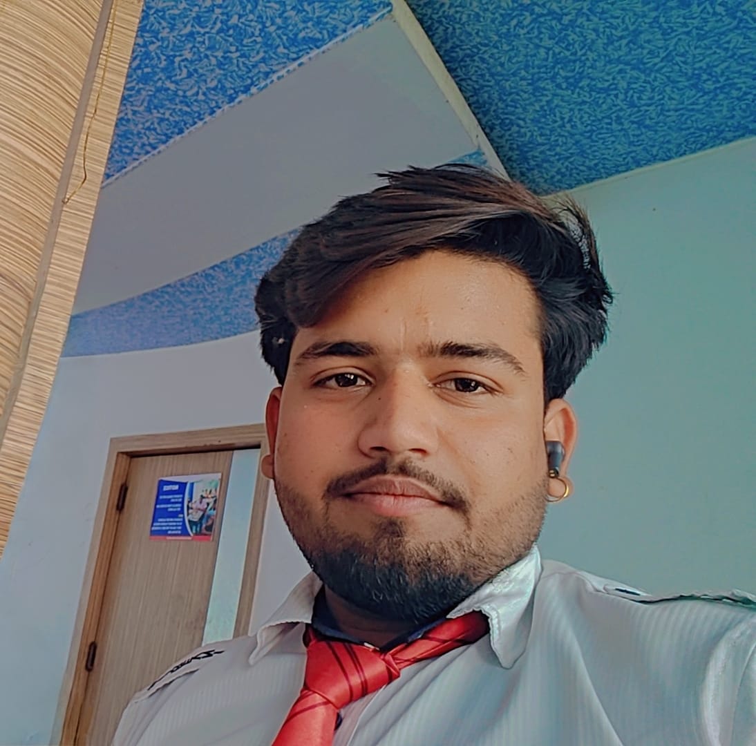 Professional headshot of Shivam Kumar, a data science professional with a confident smile, wearing business casual attire against a modern office background